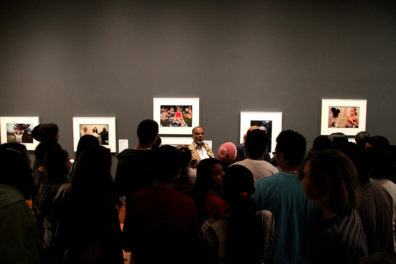 High School Students Explore Photojournalism with Sudharak Olwe