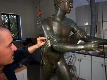 Apollo’s Drapery: An Unfolding Puzzle