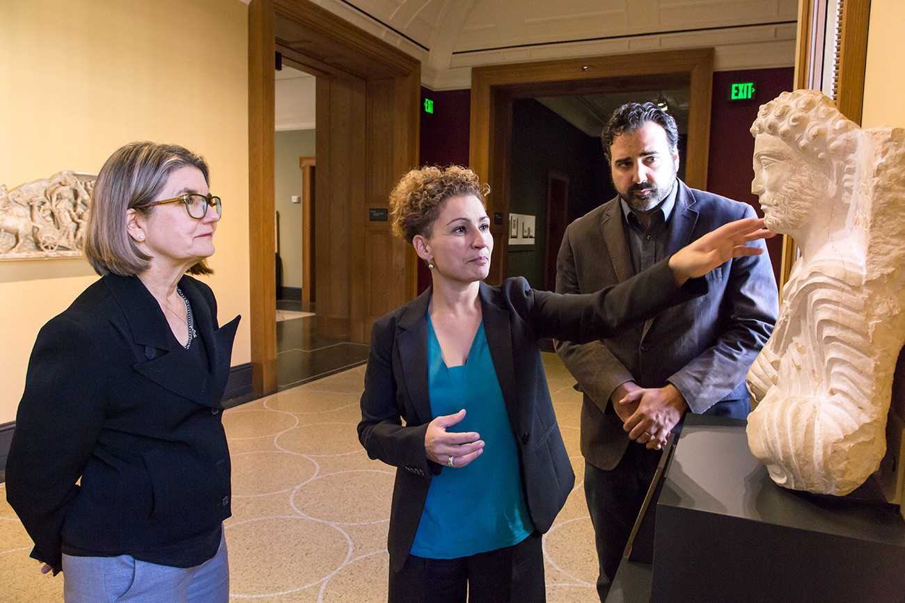 Rubina Raja, Fran Terpak, and Peter Bonfitto at the Getty Villa, looking at an ancient Palmyrene funerary bust