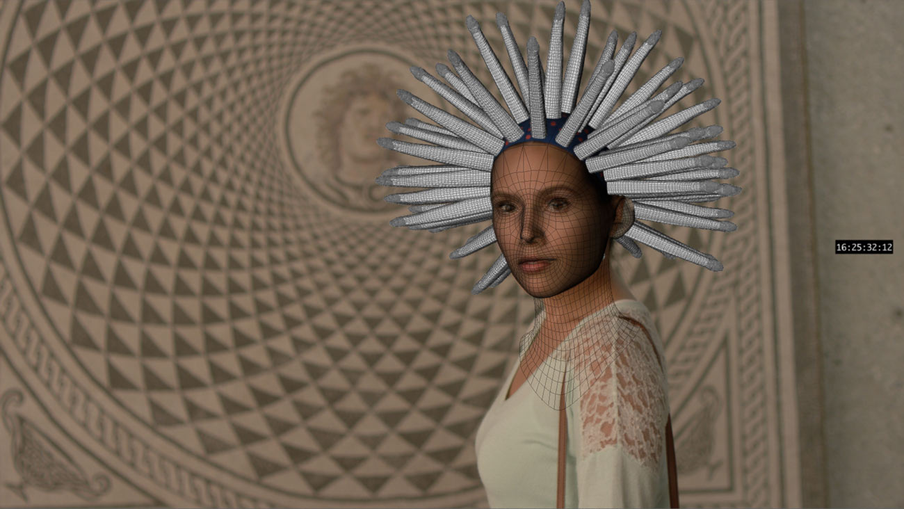 Computerized version of the women's head now has snakes sticking out like spikes.