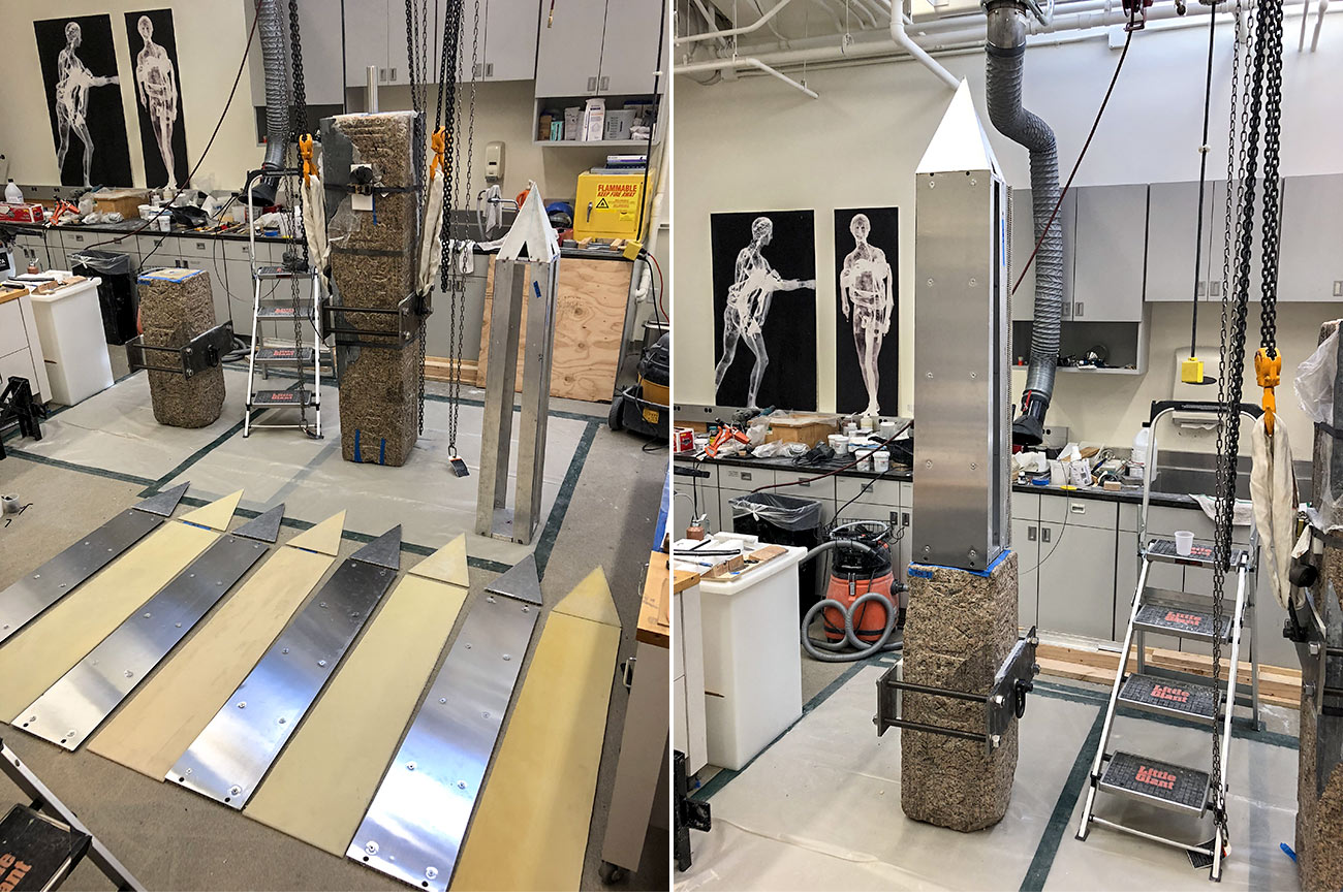 Left, Eight alternating panels with triangular tops in metal and wood shaped to form an obelisk when assembled Right, the pieces are assembled atop a stone granite base in a lab.
