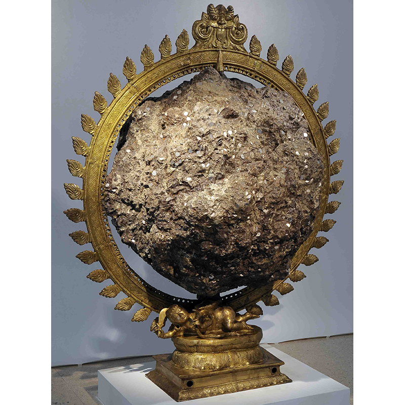 Unicode, 2011, L.N. Tallur. Bronze, coins and concrete, Height: 183 cm, Width: 152 cm, Depth: 117 cm. Kiran Nadar Museum of Art, 33SCLNT001 Unicode, 2011, L.N. Tallur. Bronze, coins and concrete, Height: 183 cm, Width: 152 cm, Depth: 117 cm. Kiran Nadar Museum of Art, 33SCLNT001