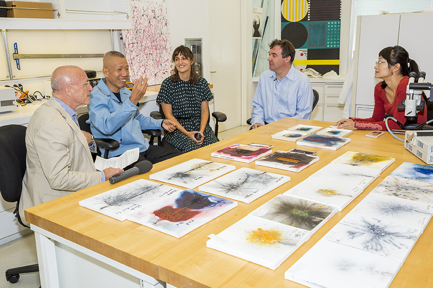 Inside a GCI Conservation Lab. From left: Jim Cuno, Cai Guo-Qiang, Rachel Rivenc, Tom Learner, and Sang Luo