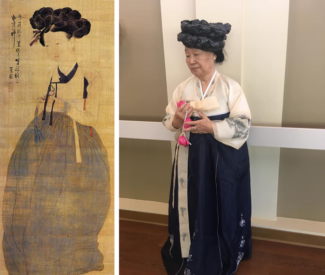 Left, a faded brown tapestry with a pale Asian woman with elaborately-braided dark hair, wearing a puffy dark skirt and white top with black trim, holding some beads; right, an older Asian woman wears a hat made of braided trash bags, and a long dress with white sleeves, embroidered with trees, and a long blue skirt. She is holding pink paper flowers.