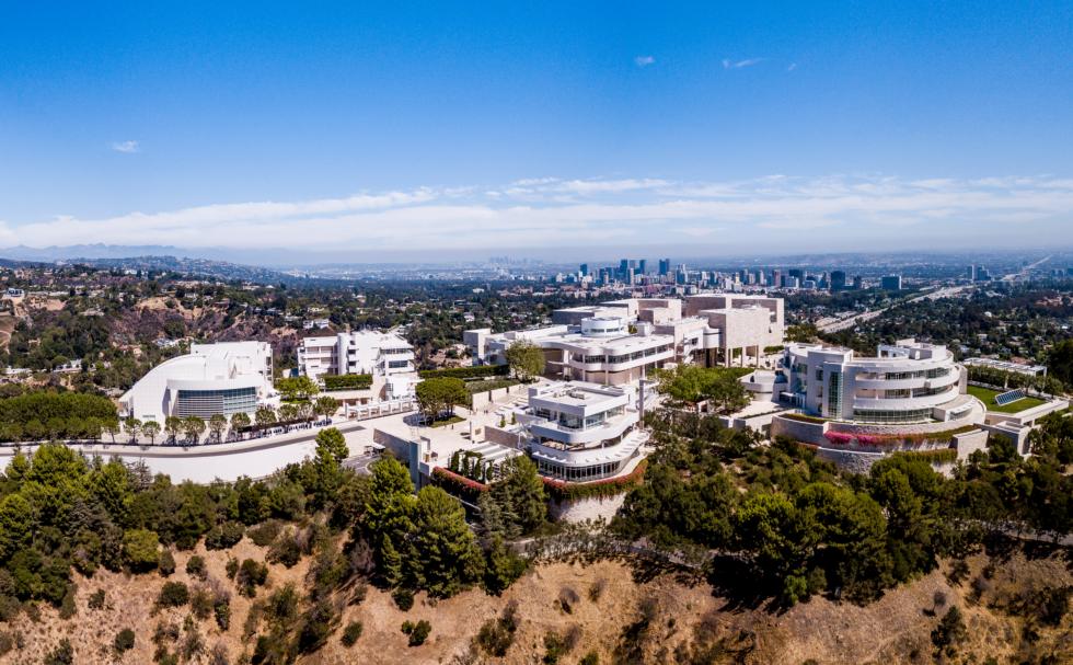 blue sky and white building below