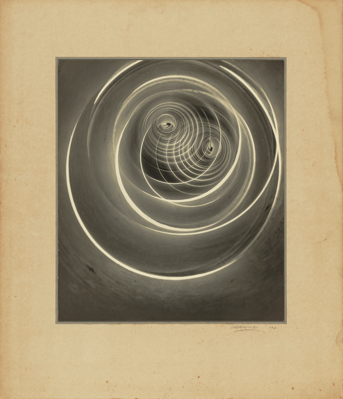 <em>Perpetual Motion</em>, 1931, Asahachi Kono. Gelatin silver or toned bromide print, 12 3/4 × 10 1/2 in. The J. Paul Getty Museum, 2019.64 Photogram showing circles that seem to be in motion