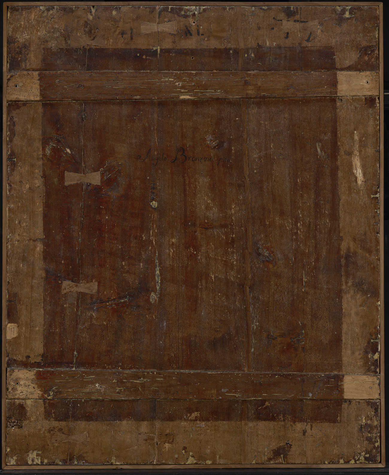 Wooden panel, with lighter wood creating a border around darker wood