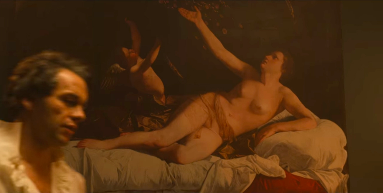 Still from Bridgerton that shows a man moving in front of a painting of a nude woman laying on a bed with her arm outstretched