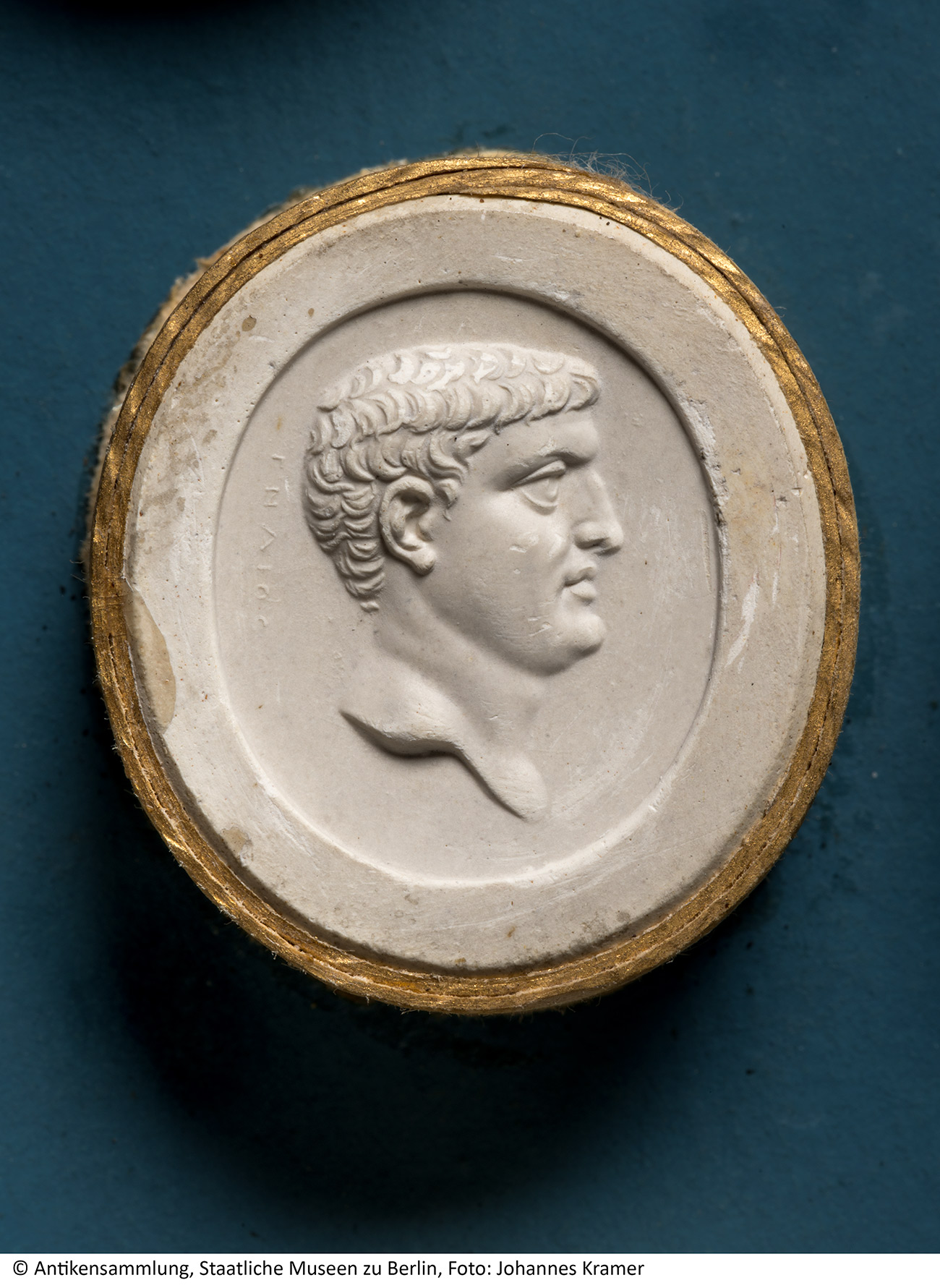 Plaster relief of a profile of a man