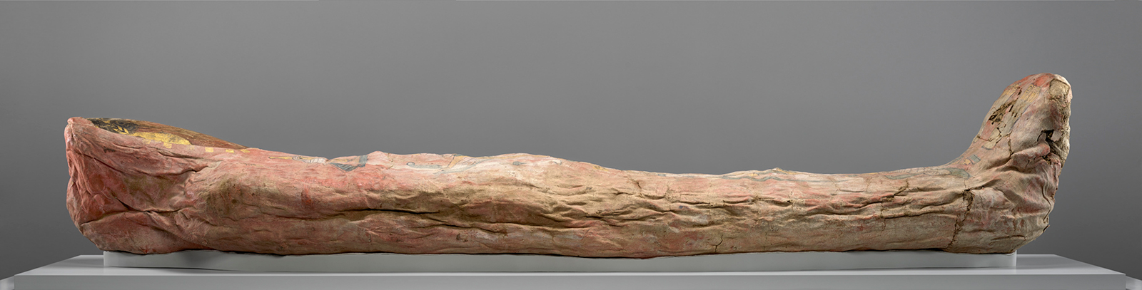 Side view of a mummy lying down