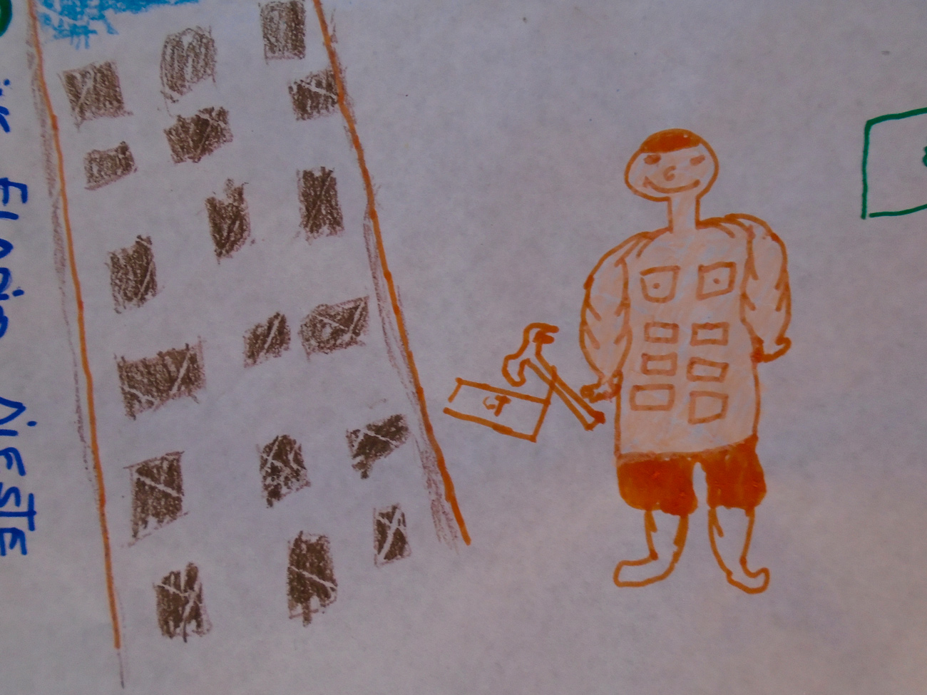 Child’s drawing of a person with bricks for ab muscles, he holds a hammer.