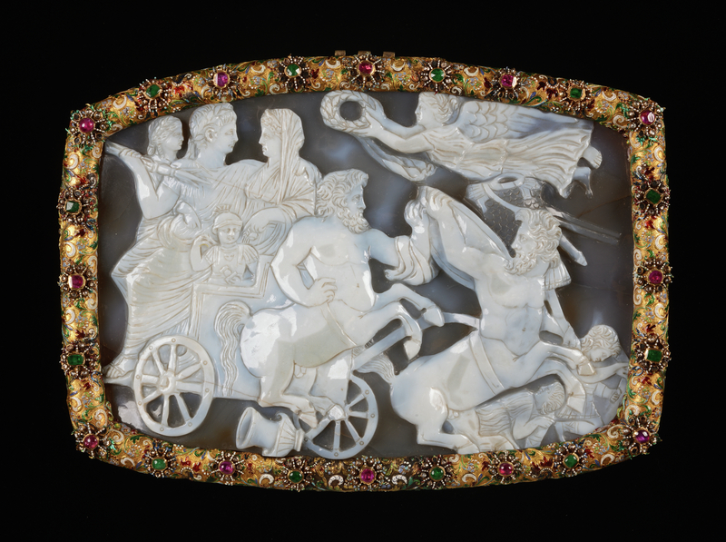 <i>The Triumph of Constantine (Gemma Constantiniana)</i>, 320–30. Sardonyx, banded agate, mounted in an ornamental frame (Antwerp 1628), decorated with inlay of (semi-)precious stones, 11 × 8 1/4 in. Rijksmuseum van Oudheden, Leiden. Image: National Museum of Antiquities, Leiden Intricately carved stone cameo with two centaurs, whose hooves are crashing down and trampling Constantine’s enemies, in a jeweled frame.