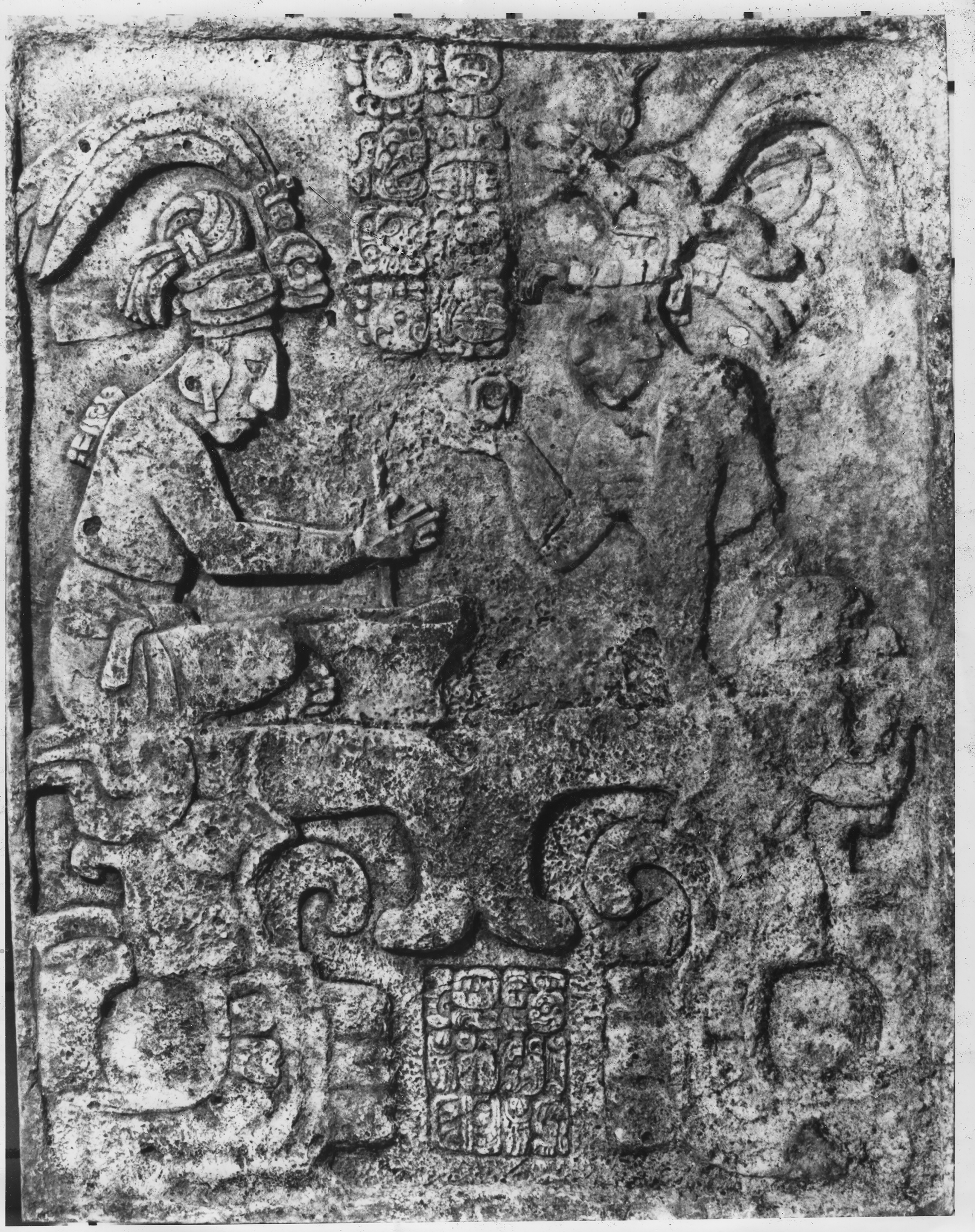 Mayuy Series Lintel 2. Guatemala, AD 769, limestone. Location unknown. Photographer unknown, ca. 1970s; © Drawing by Stephen Houston. Black and white photograph of the limestone engraving Mayuy Series Lintel 2.
