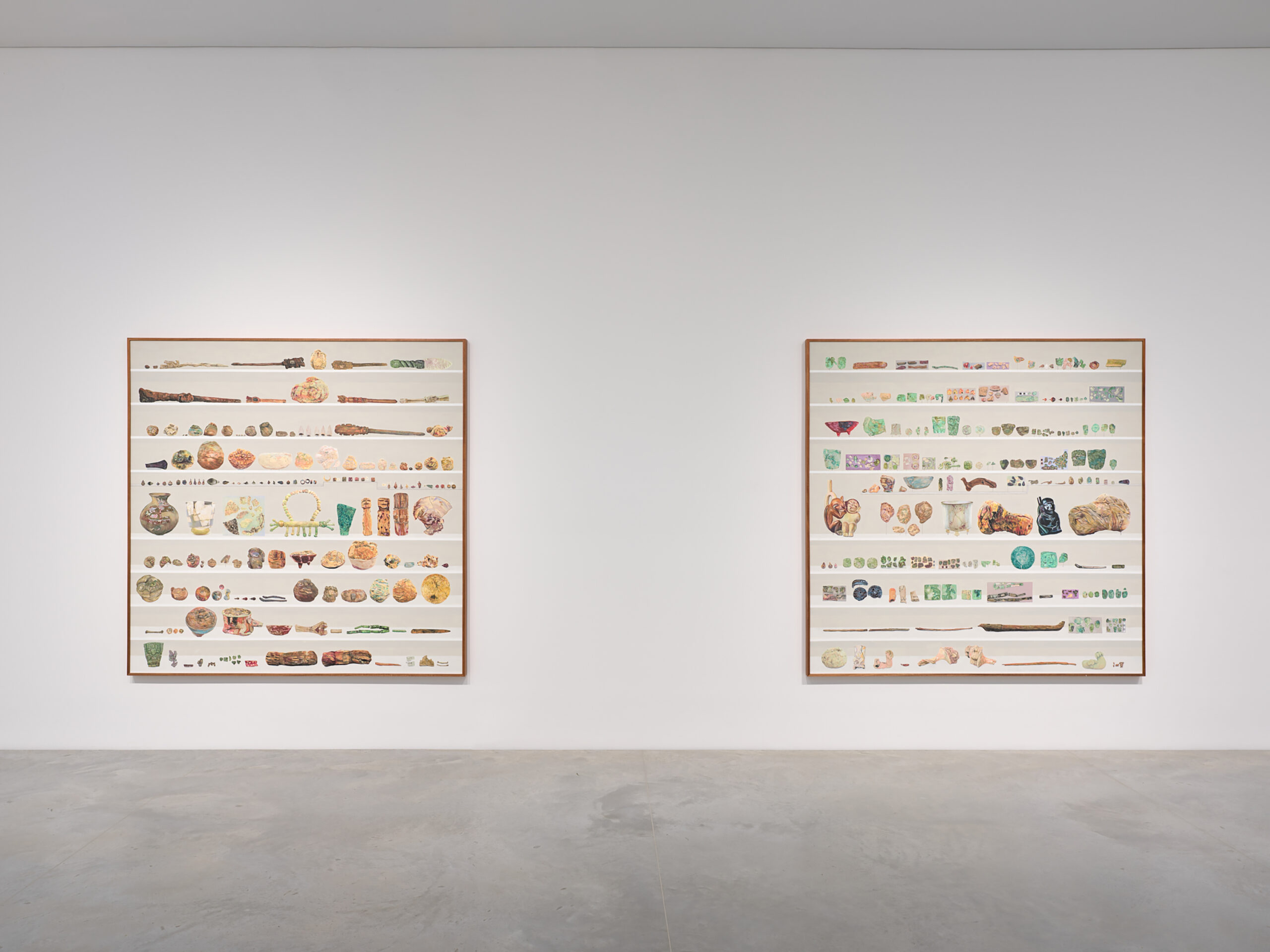 Amant-Foundtion-Fall-2021-12.15.21-31 Image of two framed photographs of items on shelves. The photographs are hung on the wall.